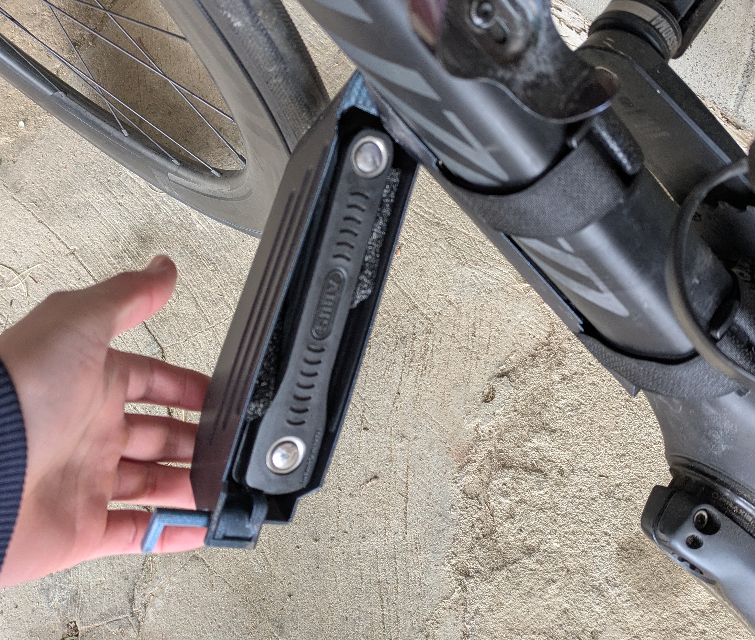 Bike down tube storage box swing open - photo 3