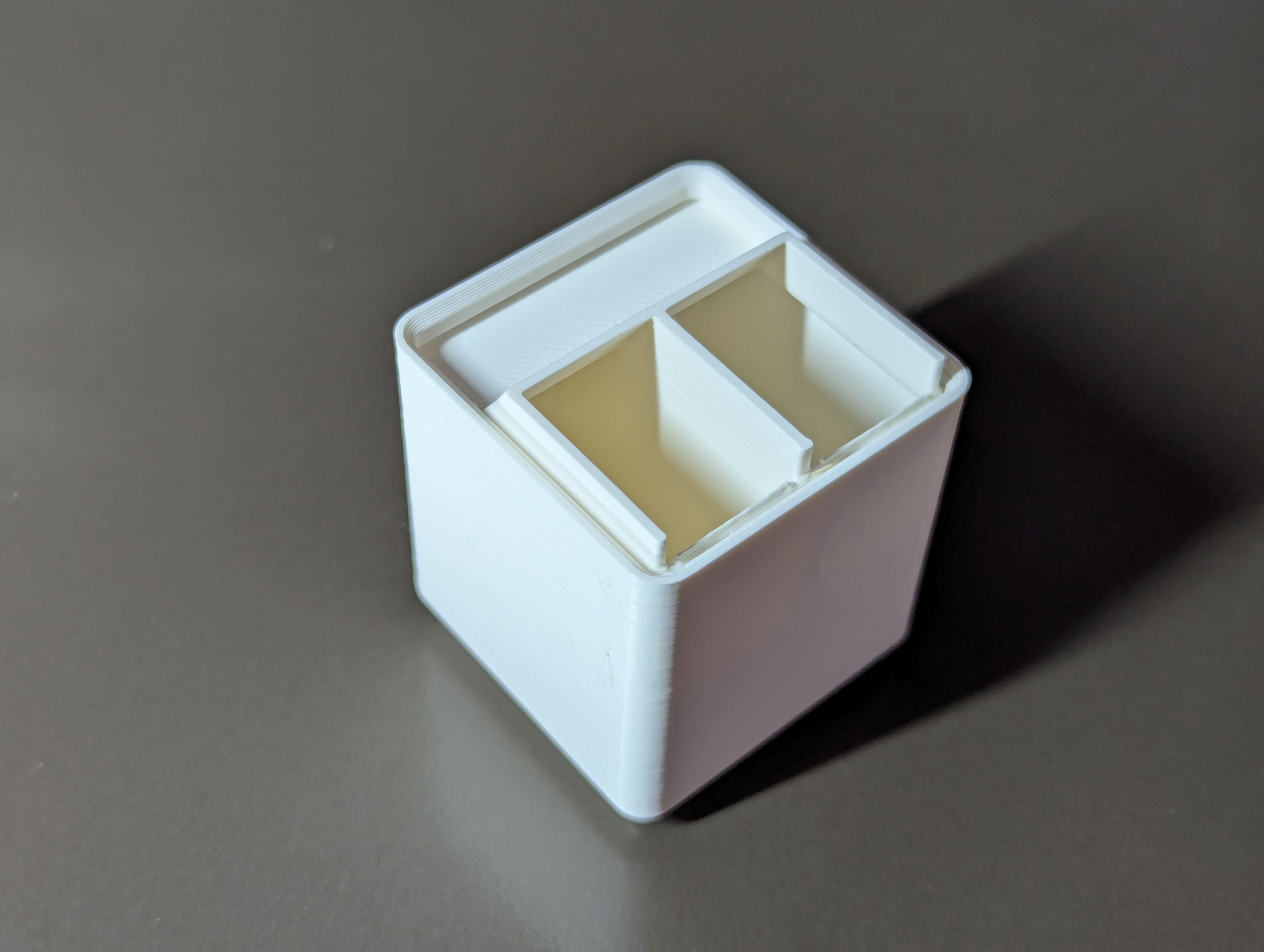 Gridfinity tray with handles and Modern Case spill protectors