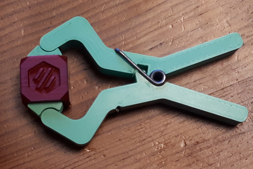 Spring clamp with a clothespin spring - photo 2
