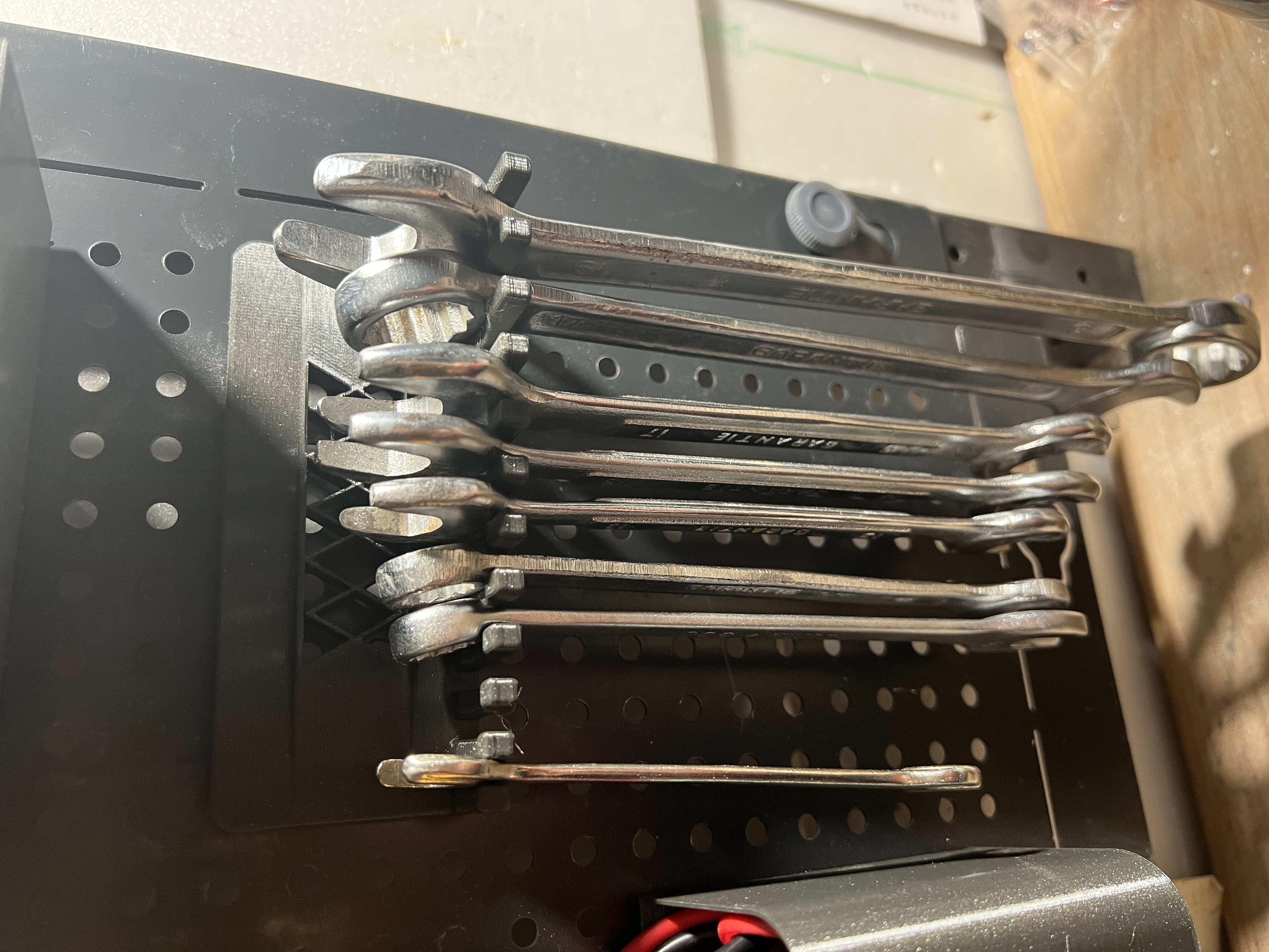 Peg board wrench holder