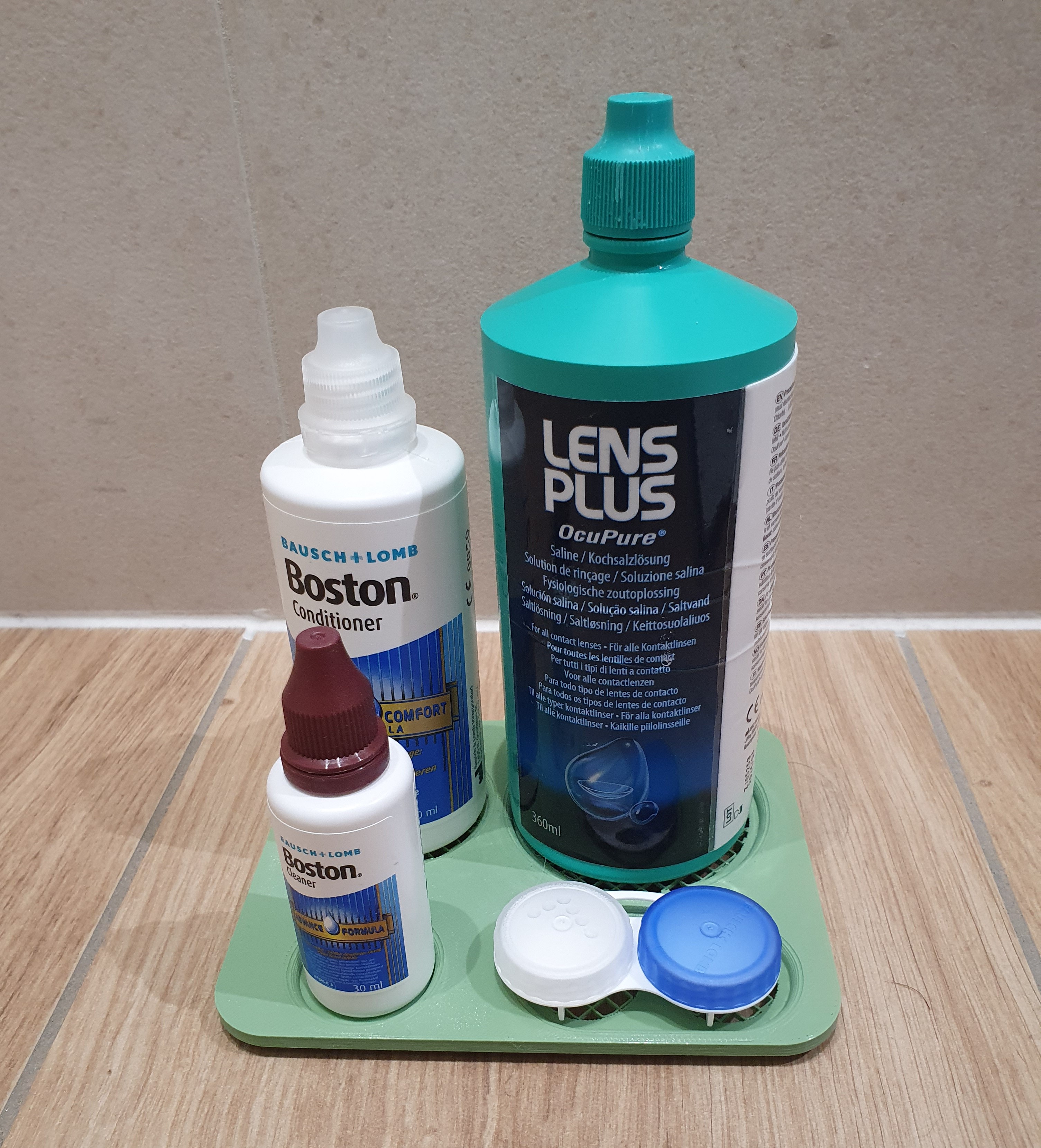 Tray for contact lens case and cleaning solutions