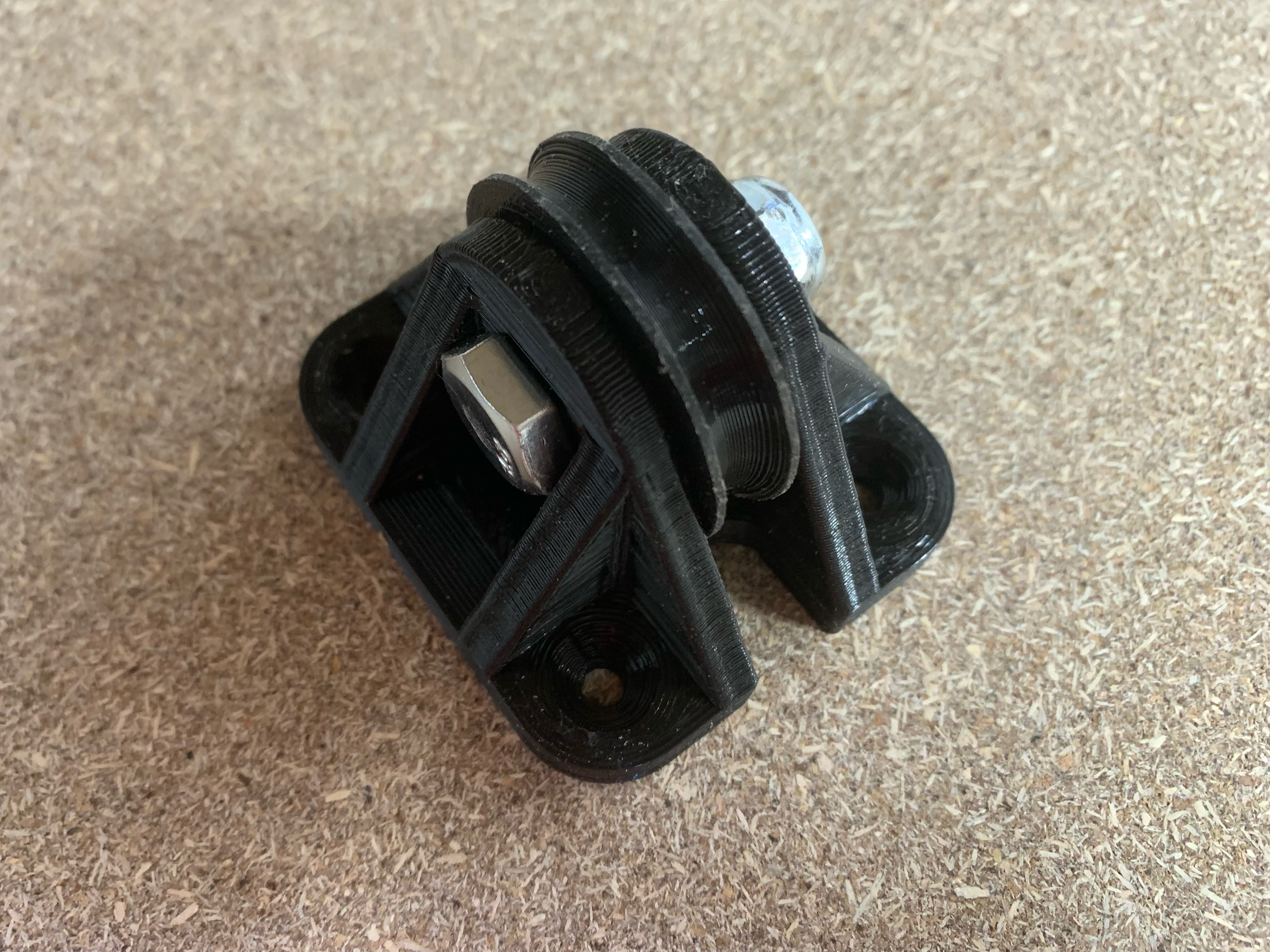608 Pulley - allows cable up/down through hole(s) in whatever the pulley is mounted to
