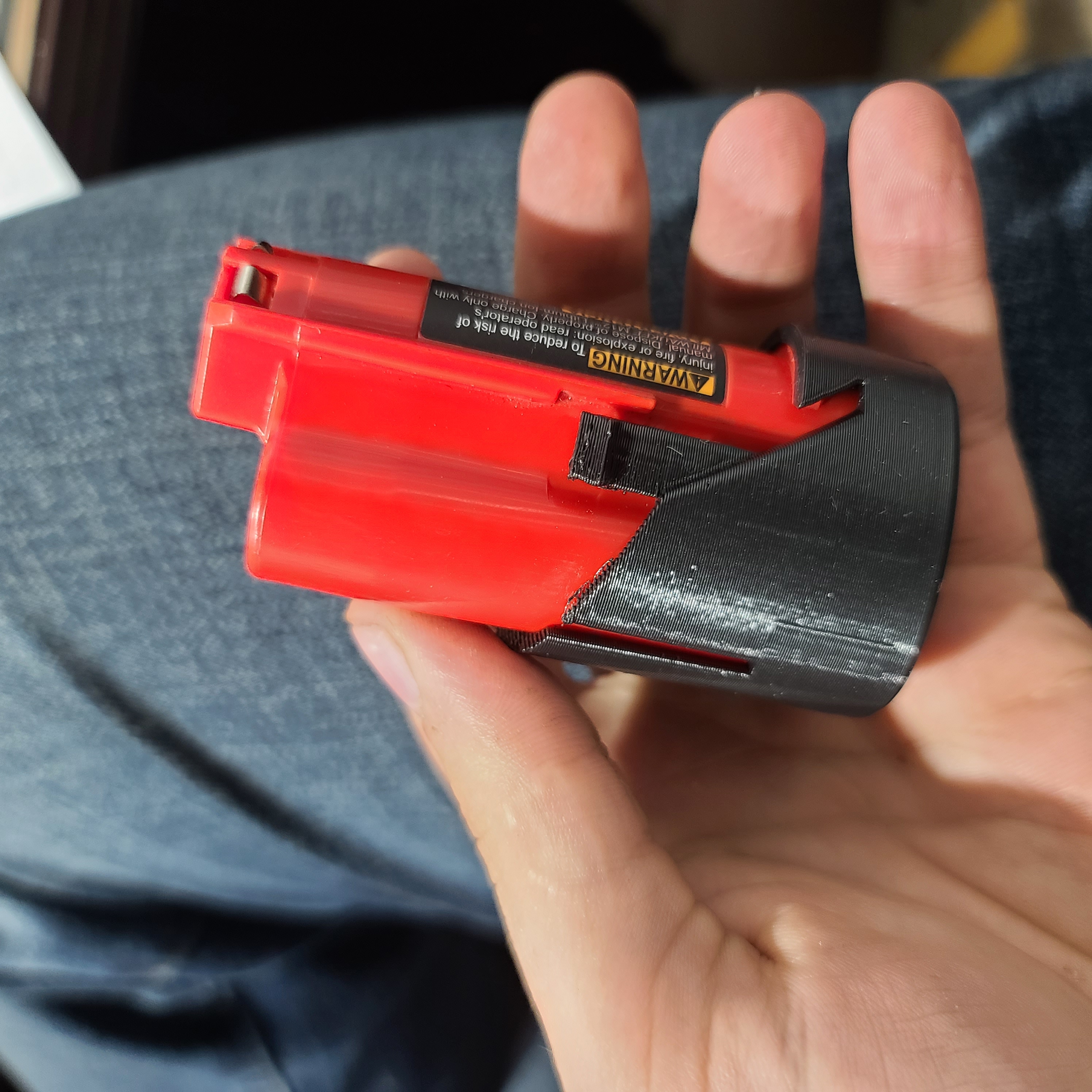 Milwaukee M12 Battery cover replacement - photo 2