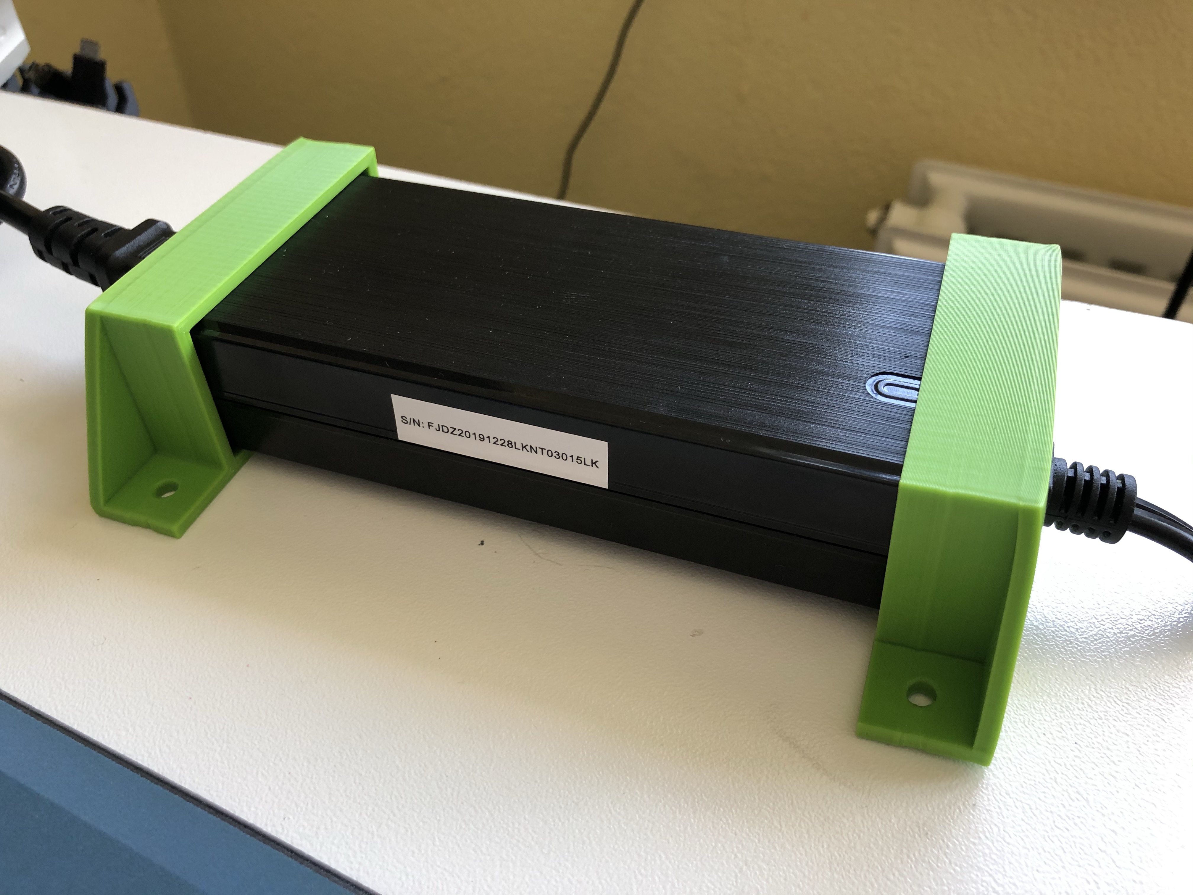 Parametric wall/ceiling/desk mount for power supply