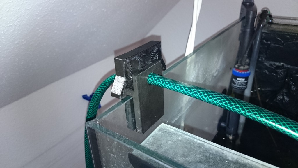 Garden hose holder clamp