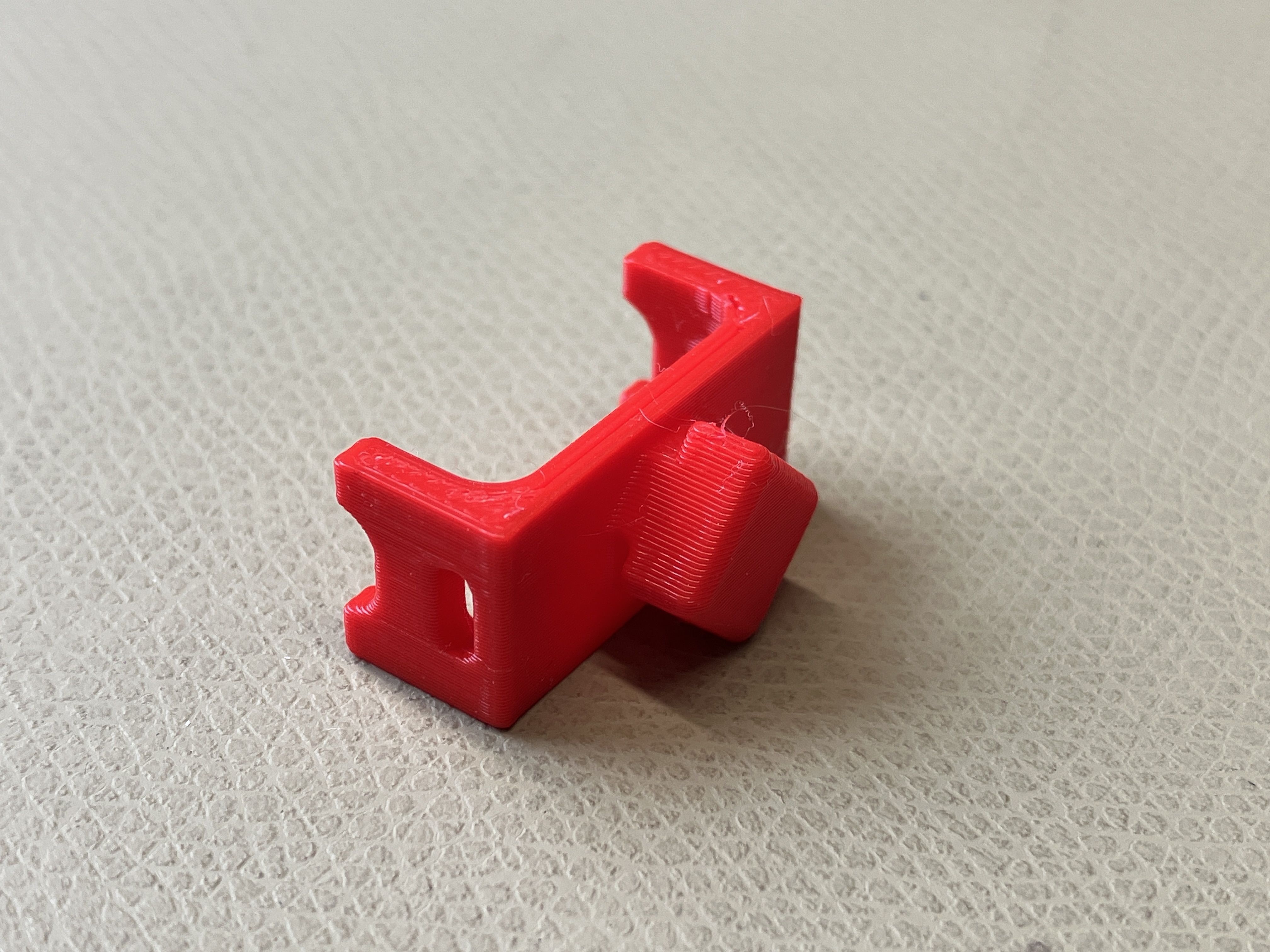 Cable clip for 9mm square hole pegboard