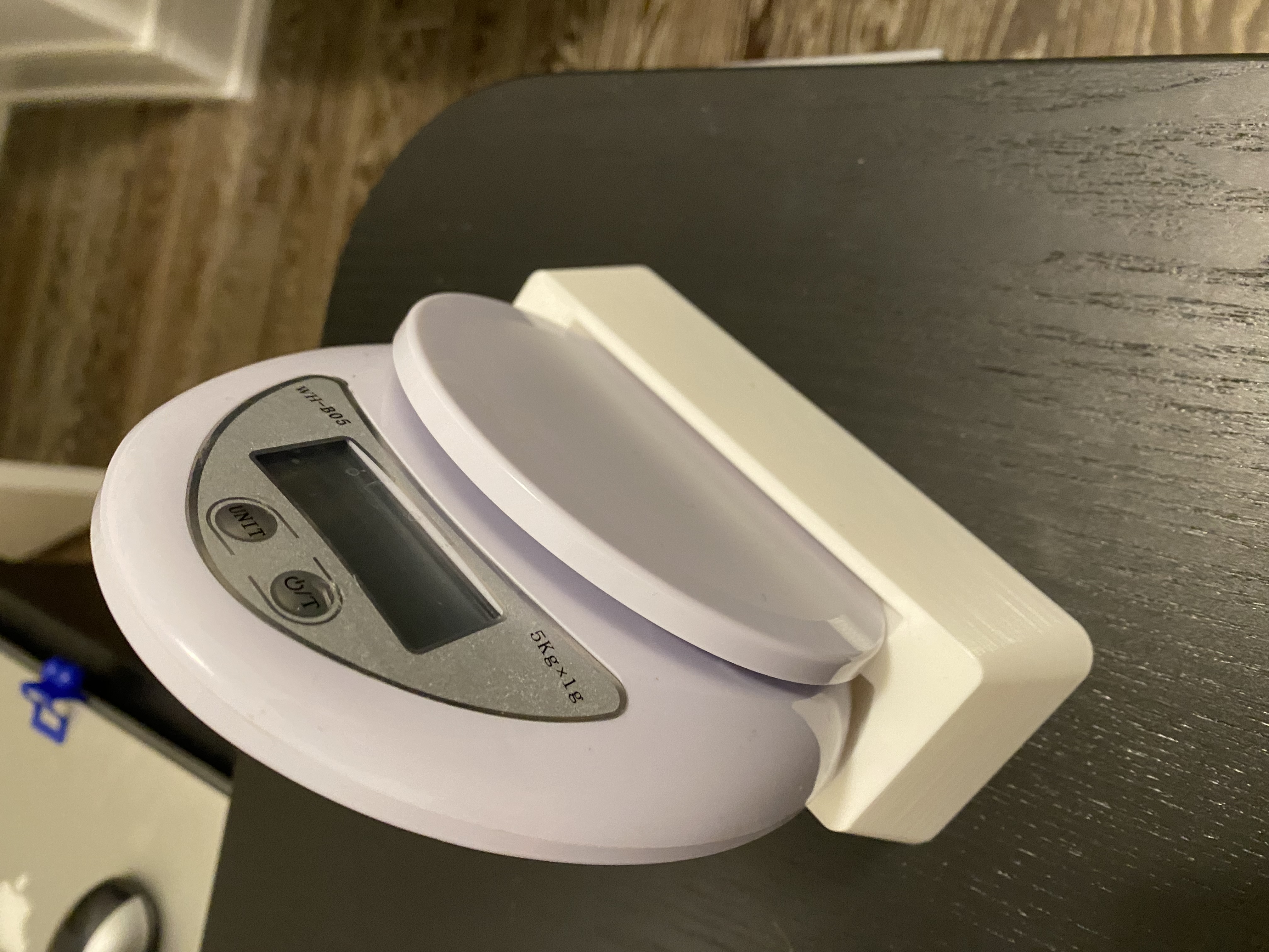 Scale Holder for Ubiquitous Cheap Ovoid Kitchen Scale