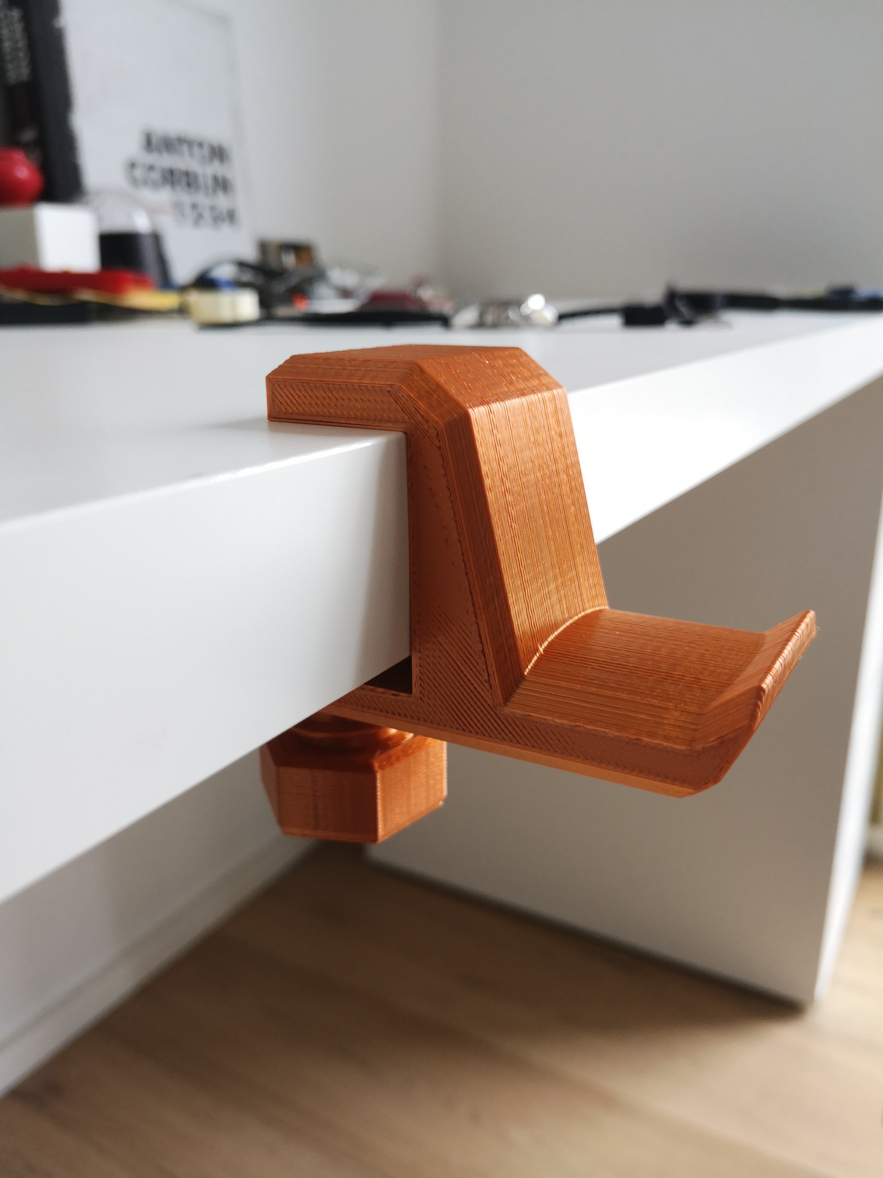Headphone hook / SD card holder