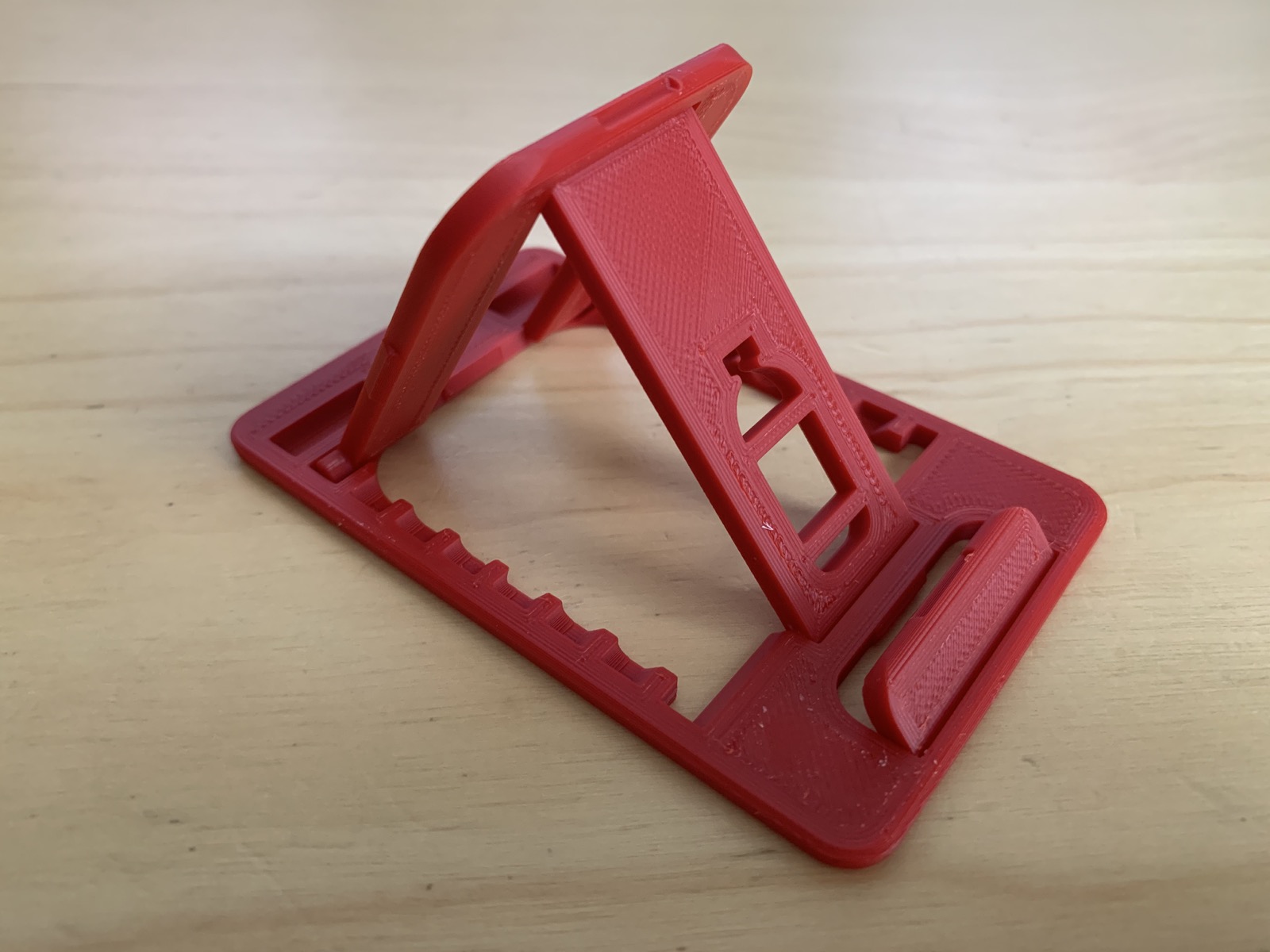Credit card sized foldable mobile stand