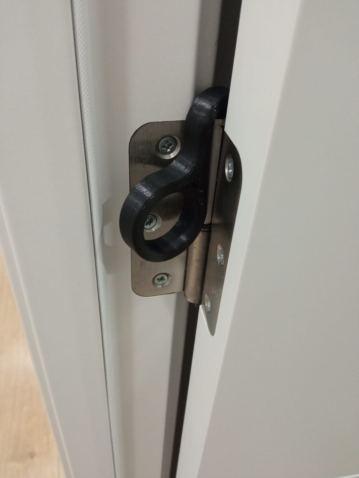 Door stop on hinge - photo 2