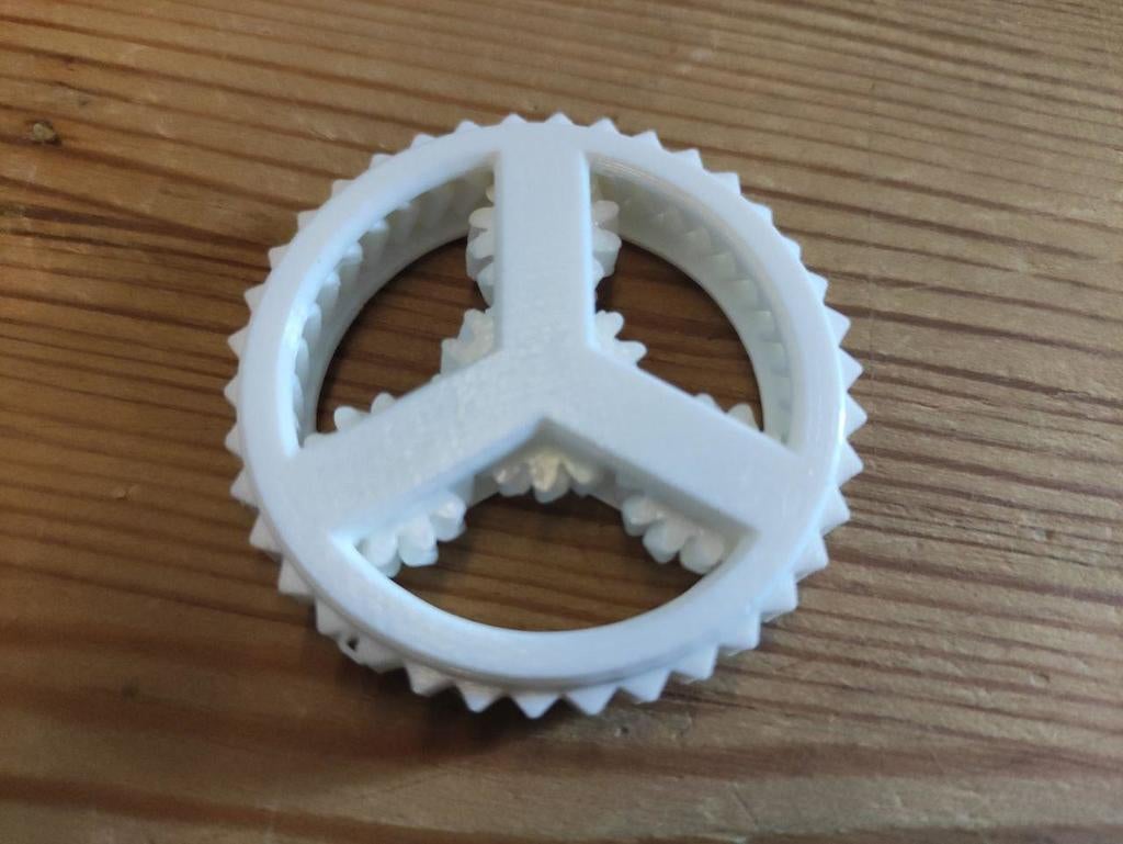 Planetary gear coin (old)