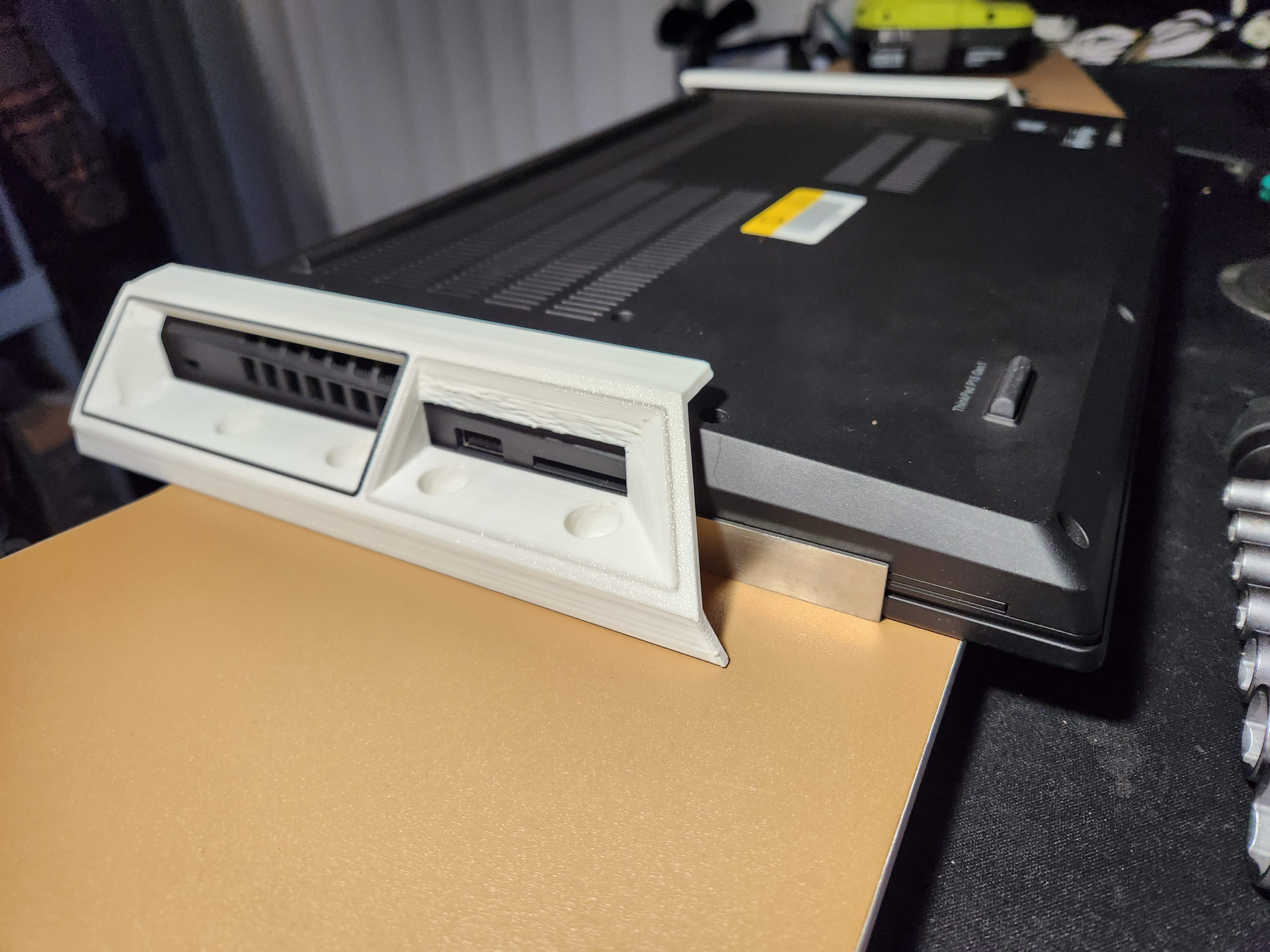 Lenovo ThinkPad P15 and P52 laptops under desk/shelf bracket mount. Optimized for 3D printing.